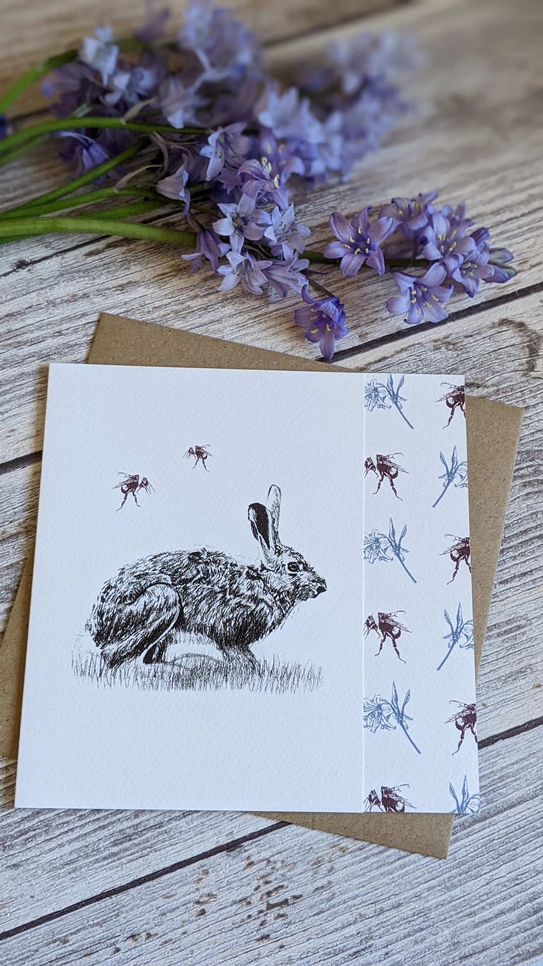 Hare drawing greeting card with floral design, nature-inspired art