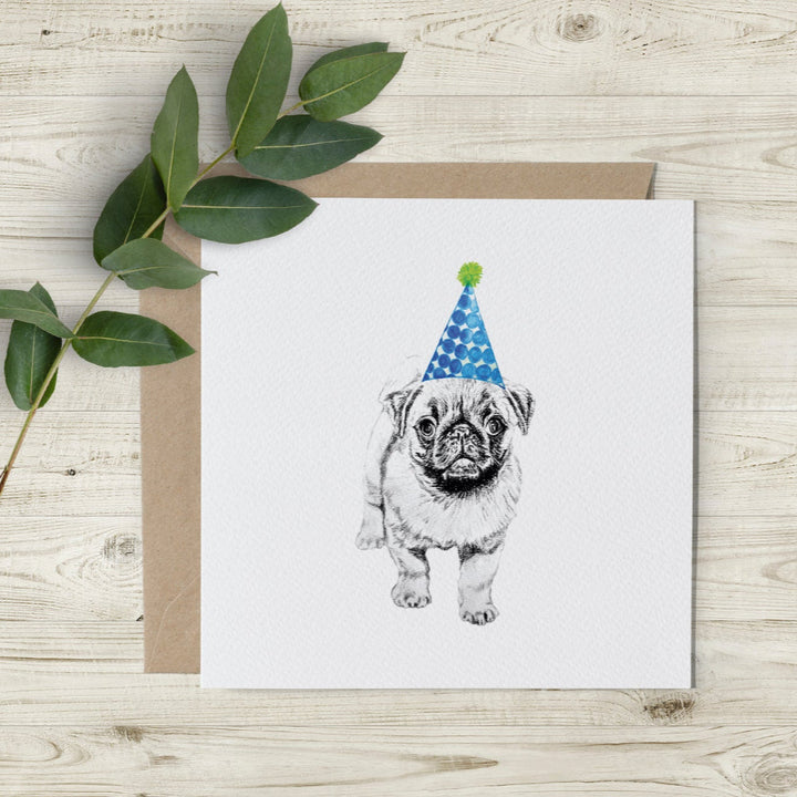 Blue Pete the pug birthday card featuring a hand-drawn pug with a party hat, by Emma Gorton, eco-friendly, made in the UK