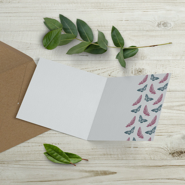 Inside view of flamingo and butterfly greeting card, featuring a delicate feather and butterfly design, printed on eco-friendly paper.