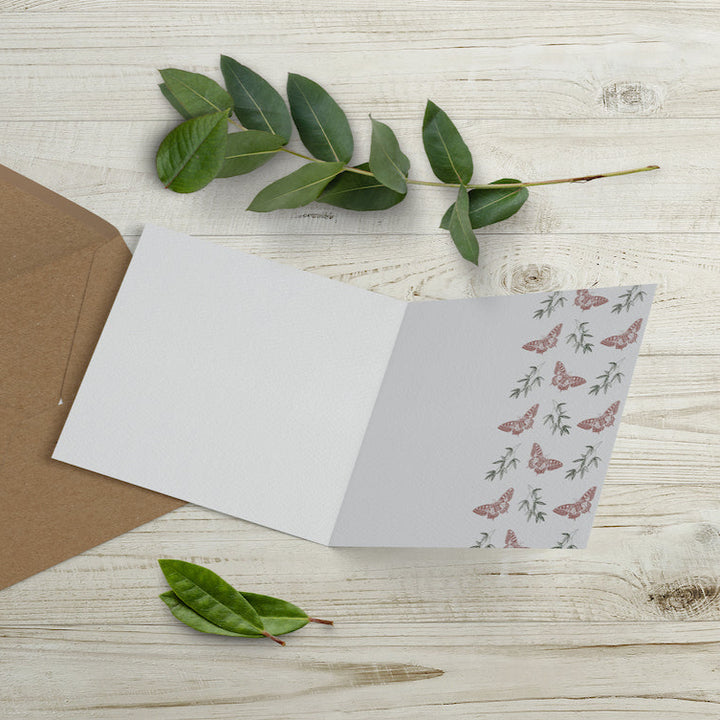 Inside of elephant and butterfly card with delicate butterflies and leaves, eco-friendly design