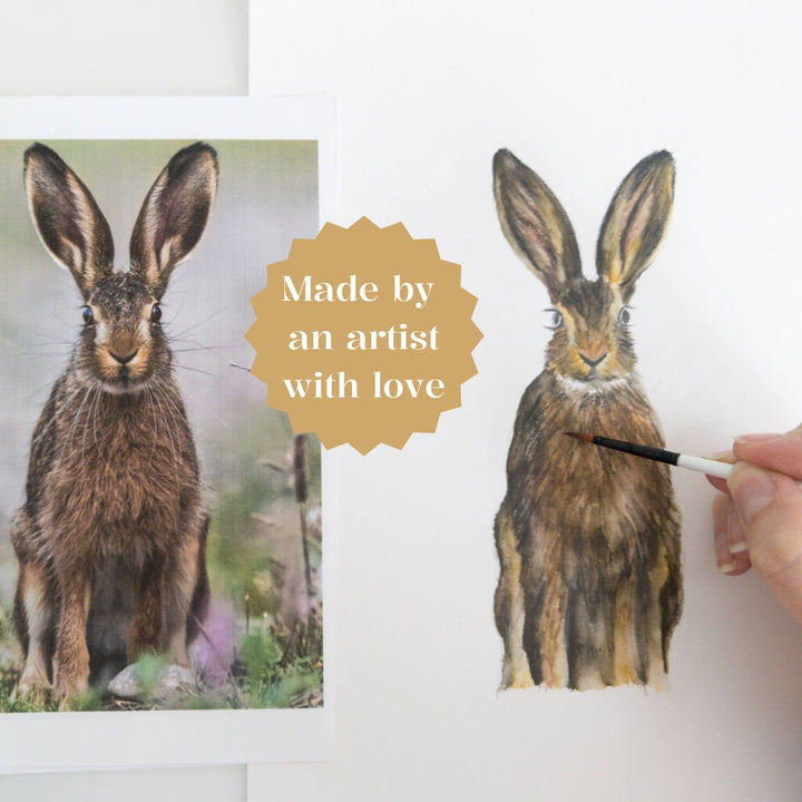 Finished hare and chicory watercolour sketches with “made by an artist with love” text