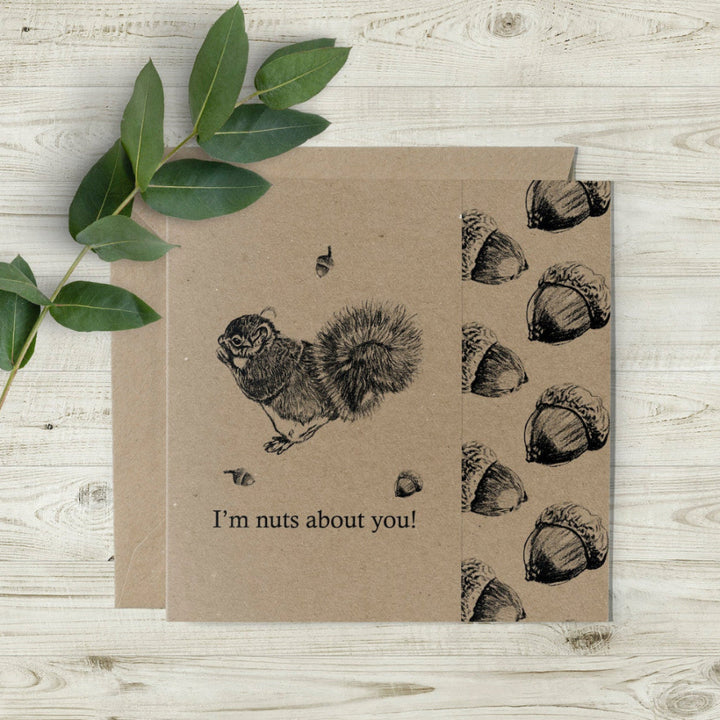 I'm Nuts About You" eco-friendly Valentine's Day and anniversary card featuring a hand-drawn squirrel and acorns design by Emma Gorton, sustainably printed in the UK