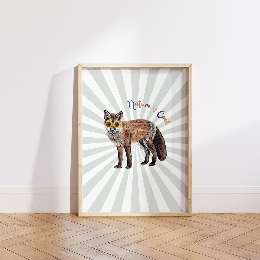 Hand-drawn fox wearing yellow sunglasses with “Nature is Cool” text on a green and white sunburst background, framed as a giclée art print.