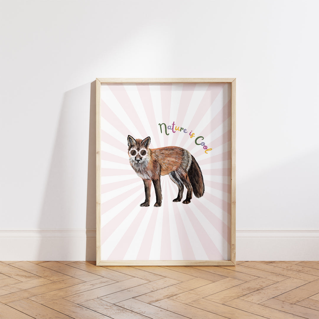 Hand-drawn fox wearing pink sunglasses with “Nature is Cool” text on a pink and white sunburst background, framed as a giclée art print.