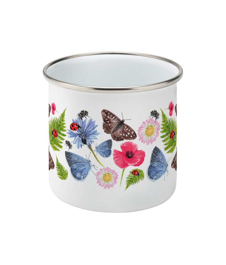 Front view of Summer Meadow enamel mug with silver rim displaying full butterfly and wildflower pattern on white background