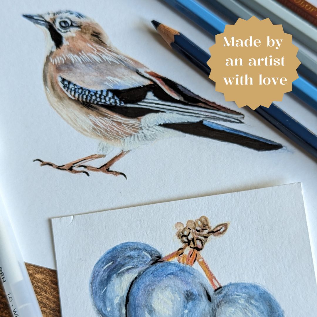 Original sketch of a jay and sloes with watercolour pencils, featuring the words "Made by an artist with love," showcasing the hand-drawn details and artistic process.